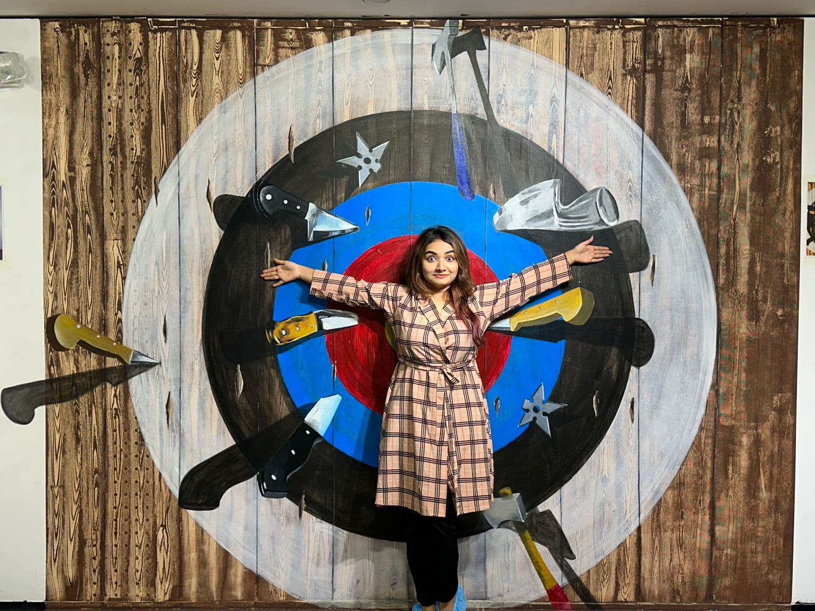 Hit by art, not by arrows. 
